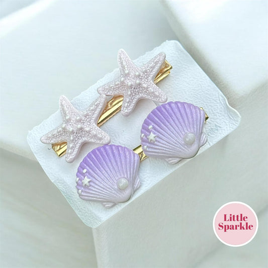 Sea shell pins