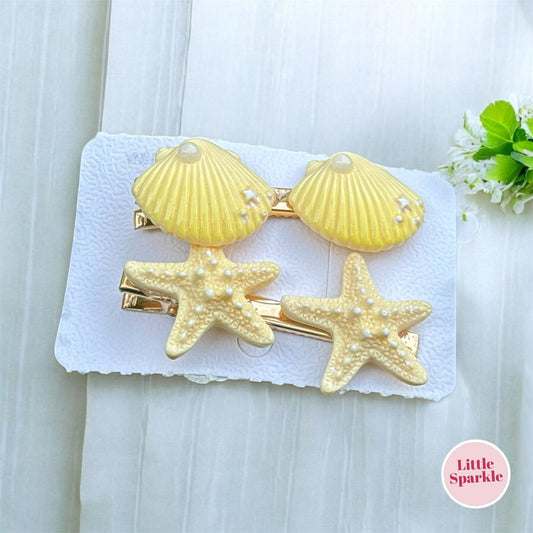 Sea shell pins